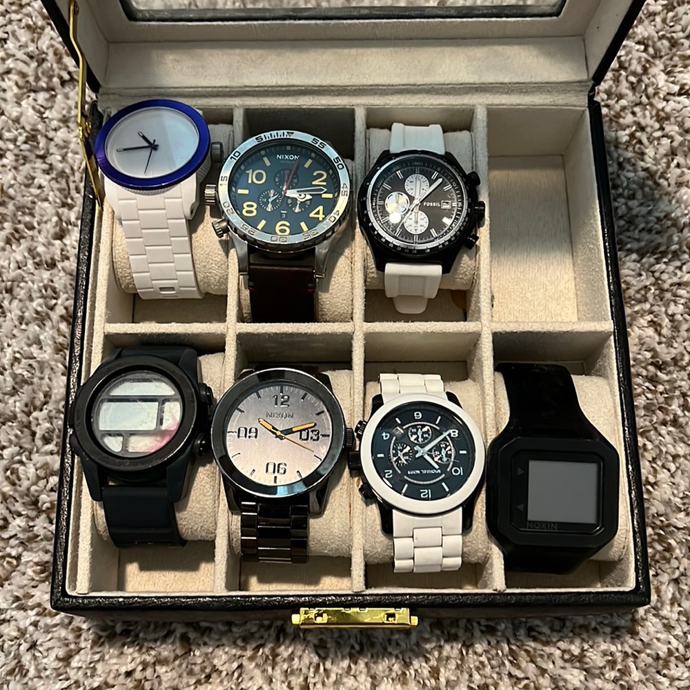 4 Nixon, 1 Diesel, 1 Fossil, and 1 Michael Kors watches